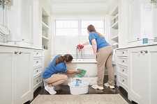 Maid Cleaning Bathroom Maid Cleaning Bathroom